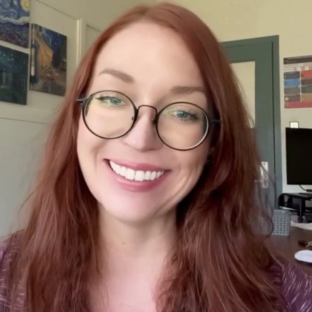 Mrs. Bennett smiling in her office